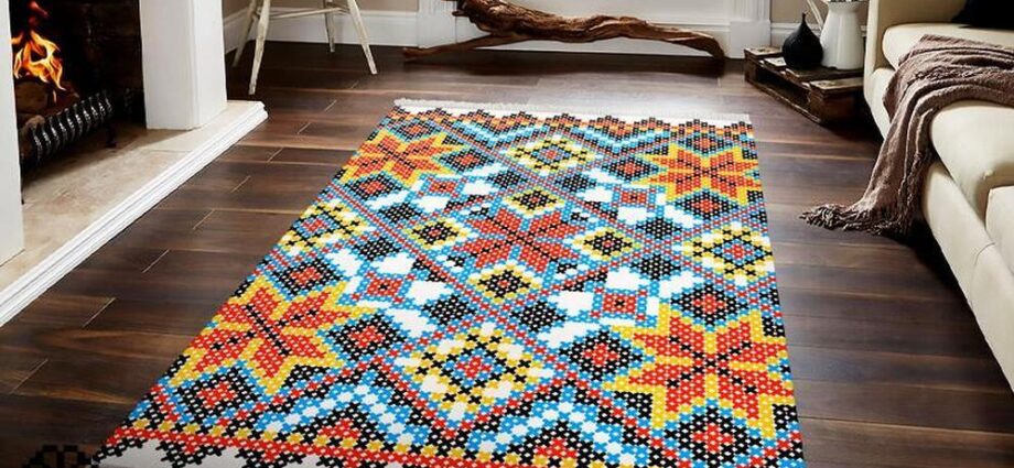 What distinguishes handmade carpets from machine-made rugs